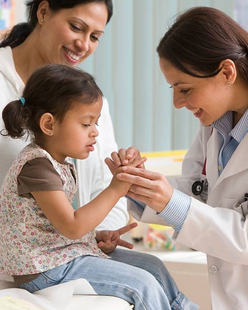 doctor-examining-toddler-girls-f